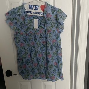 Pretty floral ruffle sleeve blouse by the Loft size large